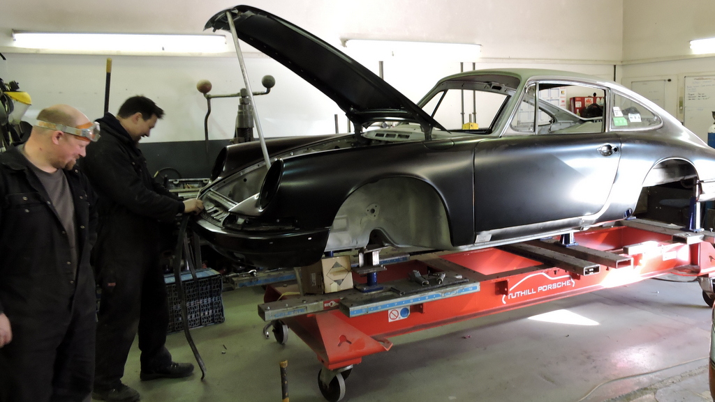 Car on a hoist at Tuthill Porsche