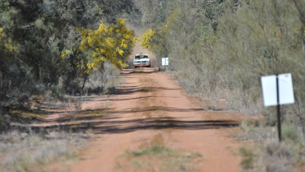Hazard boards in action - a !! board in the distance near the car and the X board at the jump. 